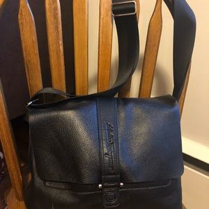 Salvatore Ferragamo black leather messenger bag with magnetic clasp
